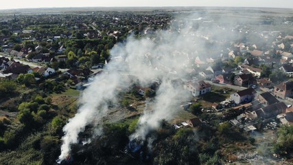 Fire smoke in the suburb area house  aerial view