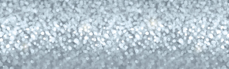Christmas gray bokeh background.Glitter vintage lights background.