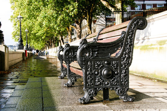 Old Cast Iron Bench On The River Embankment