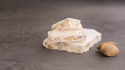 El Turron de Alicante or  The nougat of Alicante made with lightly roasted whole almonds and honey. Popular Spanish Christmas sweet.