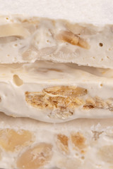 Turron, Spanish hard almond nougat, texture for pattern or background. Close up