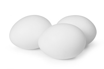 Three white eggs isolated on white background