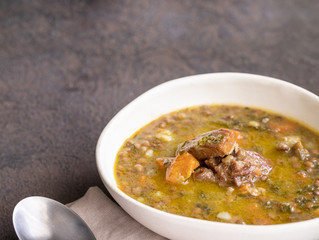 Lentejas compustas or Spanish Lentil Soup very popular homemade plate in Spanish cuisine. Autunitic ldish in local restaurant in Spain.