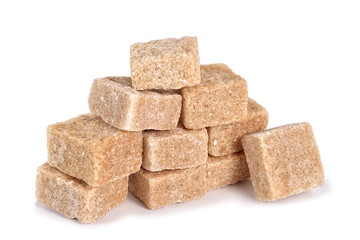 Cane sugar cubes on a white background
