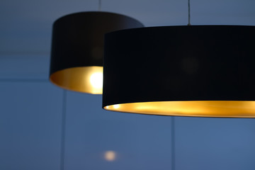 Golden lamp in a room, elegant modern home decor lighting