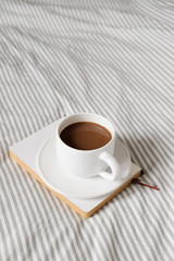 cup of coffee in scandinavian style. Breakfast in bed