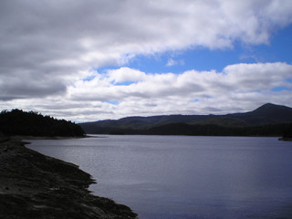 lake and mountains on west coast of tasmania 