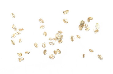 Oat flakes pile isolated on white background.