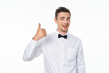 portrait of a young man with thumbs up