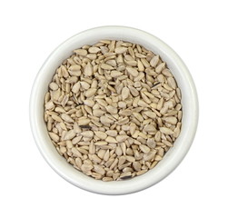 sunflower seeds in a white bowl isolated on white