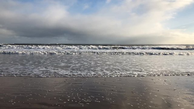 Video Of Waves Coming In From The North Sea/Ocean During A Cold, Windy, Sunny, Winter Morning At Seaburn, Sunderland, Tyne And Wear, England UK.