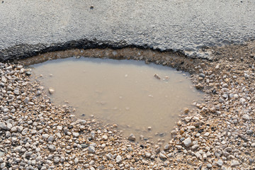 Pothole on road