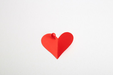 Red heart paper with red pin