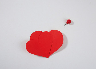Red heart paper with red pin