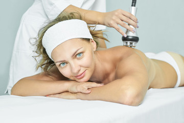 Perfect radio treatment. Woman at spa procedure. Doctor hand and girl body. RF cosmetology lifting....