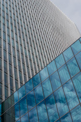 Office buildings pattern.  London Skyline modern architecture. Futuristic glass and concrete buildings. Looking up at futuristic London skyscrapers