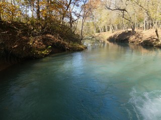 Clear blue waters flows from a spring
