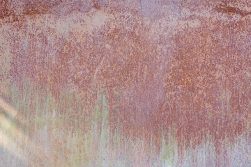 The texture is metallic with red orange and gray spots on it. Copy space for text