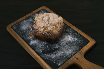 pao de deus, typical Portuguese dessert over a blackboard table