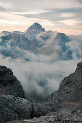 Sunset view on Triglav summit in clouds, in Julian Alps, Slovenia after hike on Jubilee via...