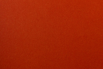 Fototapeta premium Dark red paper background.