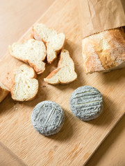 Baguette bread and blue cheese on plate. Breakfast food