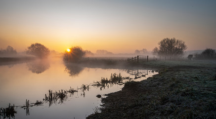 Misty Sunrise in Fotheringhay along the River Nene