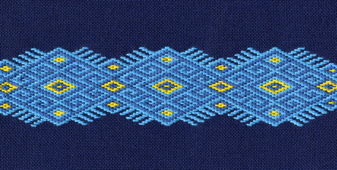 The traditional ukrainian national embroidery on dark blue cloth
