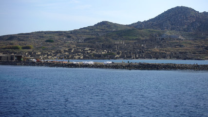 Fototapeta premium Iconic and amazing archaeological site in uninhabited island of Delos, Cyclades, Greece