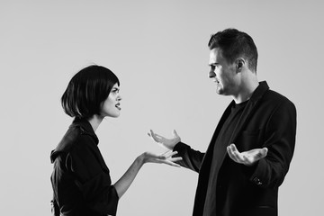 man and woman shaking hands