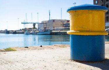 Fototapeta na wymiar rope holder on sea dock port nautical marine