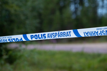 Polis avspärrat område med avspärrningsband