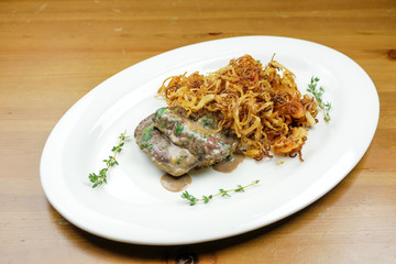 Pork dish on a restaurant table