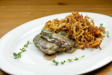 Pork dish on a restaurant table