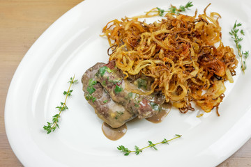 Pork dish on a restaurant table