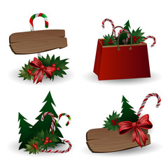 Set of festive composition with Christmas tree branches in a gift bag and boxes with bows on a white background.