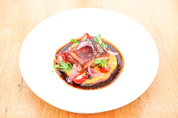 Pork dish on a restaurant table