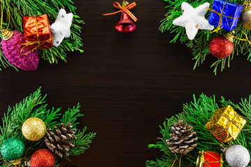 Colorful Christmas ornaments on wooden background. New year and Christmas background.