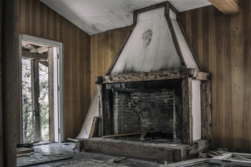 Obraz premium fireplace in an abandoned hotel