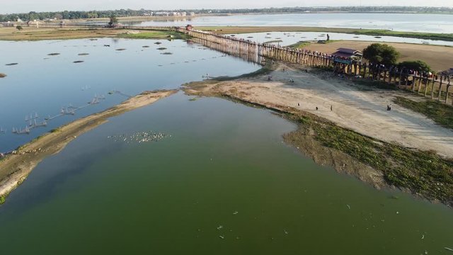 MANDALAY/MYANMAR(BURMA) - 04th Dec, 2019 : U BEIN BRIDGE is one of the famous teakwood bridge in the world. Located in Mandalay, Myanmar.