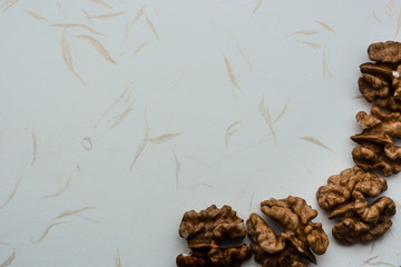 peeled walnuts on a light background