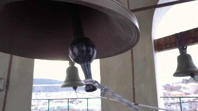 Old bell at the church. Winter.