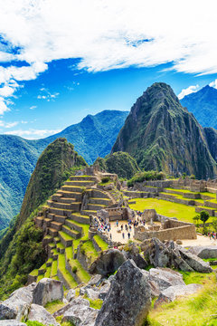 View of the ancient city of Machu Picchu, Peru. Vertical.