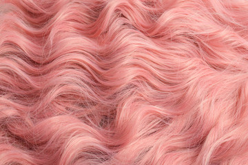 Pink wavy hair pattern. Top view.