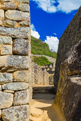 Fototapeta na wymiar View of the walls of the ancient city of Machu Picchu, Peru. Vertical.