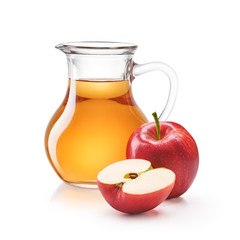 A jug of apple juice with red apples isolated on white background