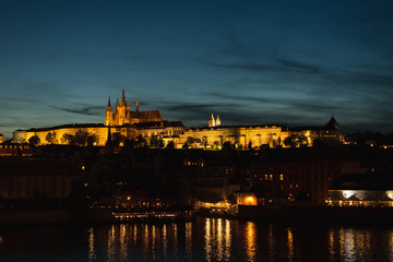 Fototapeta na wymiar Night panoramic view of Prague Castle, St. Vitus Cathedral and Charles Bridge in Prague