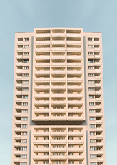 Brutalism set rythms mirror texture residential block modern yellow blue in Katowice
