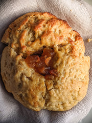 Delicious nut and peach cookie on gray cloth. Sweet and happy food concept.