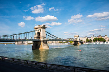 Obraz premium Budapest the Capital city of Hungary is divided by the River Danube.The Chain Bridge opened in 1849 was designed by UK engineer William Tierney Clark